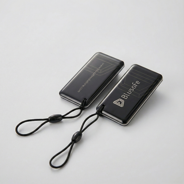 Two black Blusafe RFID key fobs with attachment loops