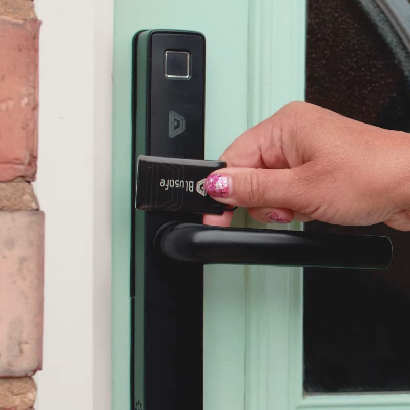 A Blusafe RFID fob held against a compatible smart lock