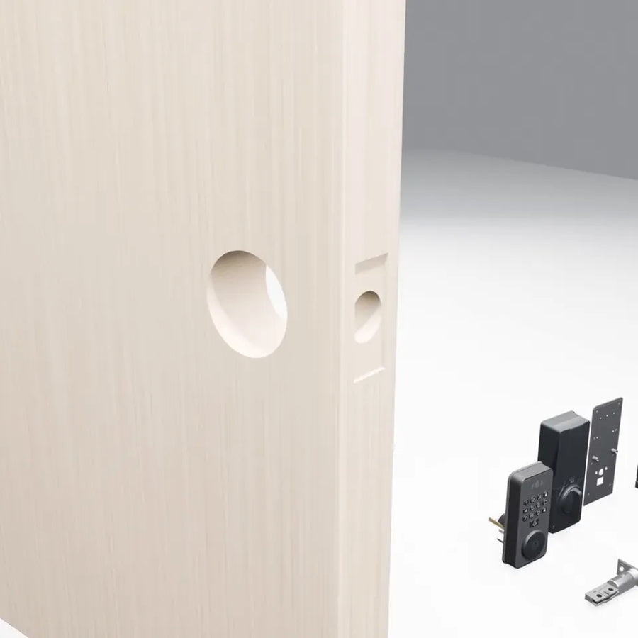 A wooden door with a 2⅛ in cross bore and a 1 in edge bore