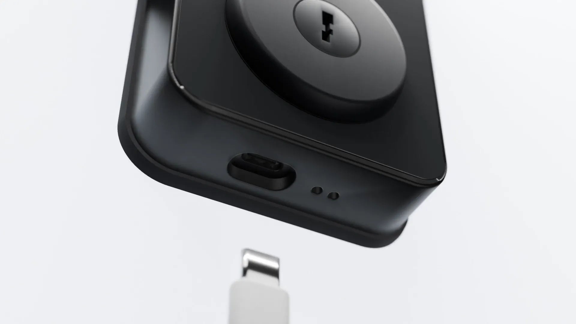 A USB-C cable plugs into the bottom edge of the Venix outside panel
